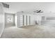 Bright bonus room featuring a large window, neutral walls, and built-in bookshelves at 2890 Wild Ginger Ct, Winter Park, FL 32792