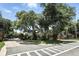 Inviting entrance to the Bear Gully Pointe community with lush landscaping at 2890 Wild Ginger Ct, Winter Park, FL 32792