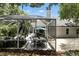 Screened-in pool with an outdoor dining area, offering a perfect setting for relaxation at 2890 Wild Ginger Ct, Winter Park, FL 32792