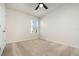 Cozy bedroom featuring a window and a ceiling fan at 3110 Areca Ave, New Smyrna Beach, FL 32168