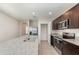 Modern kitchen with granite countertops, stainless steel appliances and ample cabinet space at 3110 Areca Ave, New Smyrna Beach, FL 32168