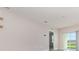 Bright living room with tile flooring, sliding glass doors and neutral wall colors at 3110 Areca Ave, New Smyrna Beach, FL 32168