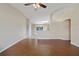 Bright living room featuring tile floors, a ceiling fan, and an open layout at 3313 Buckland St, Deltona, FL 32738