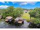 Picturesque lake view showcasing boat docks amidst serene water lilies at 3531 Oriskany Dr, Orlando, FL 32820