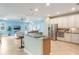 Open-concept kitchen featuring granite island, stainless steel appliances, and ample cabinet space at 3531 Oriskany Dr, Orlando, FL 32820