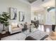 Open-concept living room showcasing a view to the dining room and lots of natural light at 3531 Oriskany Dr, Orlando, FL 32820