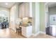 Office nook with granite counters, cabinets and chair next to dining area at 3531 Oriskany Dr, Orlando, FL 32820