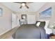 Bedroom with a ceiling fan and closet for storage at 3531 Reston Dr, The Villages, FL 32162