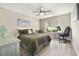 Bedroom with a large window and desk space at 3531 Reston Dr, The Villages, FL 32162