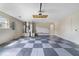 Garage with epoxy floor and walls. Plenty of parking and storage at 3531 Reston Dr, The Villages, FL 32162