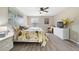 Calm main bedroom with neutral tones, a ceiling fan, and plenty of natural light at 3531 Reston Dr, The Villages, FL 32162