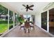 Charming sunroom with all-weather patio furniture set at 3531 Reston Dr, The Villages, FL 32162
