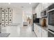 Spacious kitchen showcases a central island, stainless appliances, and ample storage at 3866 Cabo Rojo Dr, St Cloud, FL 34772