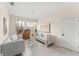 Comfortable living room featuring neutral tones, tile floors, and stylish decor at 3866 Cabo Rojo Dr, St Cloud, FL 34772