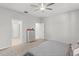 Bright bedroom featuring neutral paint, carpet, and ensuite bathroom access at 3866 Cabo Rojo Dr, St Cloud, FL 34772