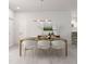 Elegant dining room featuring a modern light fixture and seating for six at 5381 Sw 128Th Street Rd, Ocala, FL 34473