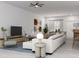 Open-concept living room with sleek furniture, stylish decor, and modern lighting fixtures at 5381 Sw 128Th Street Rd, Ocala, FL 34473