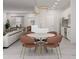 Open concept kitchen and living space with a modern design and natural light at 5381 Sw 128Th Street Rd, Ocala, FL 34473