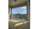 Screened balcony with bright natural light and scenic outdoor view at 6434 Cava Alta Dr # 401, Orlando, FL 32835