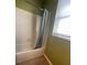 Bathroom features a shower/tub combo with a light blue shower curtain at 6434 Cava Alta Dr # 401, Orlando, FL 32835