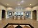 Lobby of the clubhouse featuring interior decorations and plenty of seating at 6434 Cava Alta Dr # 401, Orlando, FL 32835