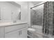Well-lit bathroom featuring a shower-tub combo and a single sink vanity at 6458 Pine Warbler Way, St Cloud, FL 34771