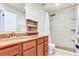 Modern bathroom features a sleek, glass-enclosed shower with marble-like tile and a vanity with marble top at 698 Roaring Dr # 382, Altamonte Springs, FL 32714