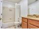 Traditional bathroom featuring a bathtub and a vanity with storage space at 698 Roaring Dr # 382, Altamonte Springs, FL 32714