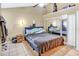 Neutral toned bedroom featuring a mirrored closet, and a ceiling fan for added comfort at 698 Roaring Dr # 382, Altamonte Springs, FL 32714