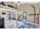Multipurpose room furnished with gym equipment and a mirrored closet at 698 Roaring Dr # 382, Altamonte Springs, FL 32714
