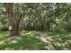 Beautifully landscaped surroundings with lush trees, offering a serene and natural ambiance at 698 Roaring Dr # 382, Altamonte Springs, FL 32714