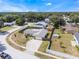 Enjoy this home's aerial view with its spacious yard and convenient access to local amenities at 7750 Murcott Cir, Orlando, FL 32835