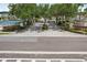 Community entrance with well manicured landscaping and decorative signage at 8801 Crayson Ct, Kissimmee, FL 34747