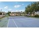 Community tennis court with basketball hoop in background, ideal for sports enthusiasts at 8801 Crayson Ct, Kissimmee, FL 34747