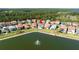 Panoramic aerial perspective of this community with scenic views of the surrounding lakes and lush landscaping at 10427 Royal Cypress Way, Orlando, FL 32836