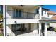 Backyard patio area featuring comfortable seating and outdoor dining options, perfect for relaxation and entertainment at 10427 Royal Cypress Way, Orlando, FL 32836