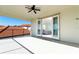 Spacious balcony with tile flooring and a view of the bedroom and surrounding rooftops at 10427 Royal Cypress Way, Orlando, FL 32836