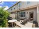 Cozy backyard with patio, seating, grill, and string lights at 11686 Water Run Aly, Windermere, FL 34786