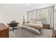 Comfortable bedroom with neutral carpet, soft lighting, and soothing decor offers a peaceful retreat at 11686 Water Run Aly, Windermere, FL 34786