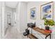 Hallway niche features built-in desk and decor for a functional and decorative space at 11686 Water Run Aly, Windermere, FL 34786