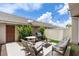Relaxing patio area with seating, grill, and string lights at 11686 Water Run Aly, Windermere, FL 34786