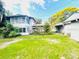 Exterior shot of the backyard and 2-story house at 1403 N Fern Creek Ave, Orlando, FL 32803