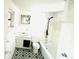 Cozy bathroom with tiled floors, and a tub/shower combo, ready for renovation at 1403 N Fern Creek Ave, Orlando, FL 32803