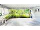 Covered patio area overlooking greenery at 1403 N Fern Creek Ave, Orlando, FL 32803