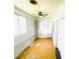 Enclosed sunroom featuring windows, light, and a patterned floor at 1403 N Fern Creek Ave, Orlando, FL 32803