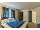 Standard bedroom with carpet, window, and closet storage for comfort and convenience at 1421 Summit Hill Dr, Deltona, FL 32725