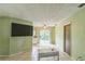 Spacious living room with tile flooring, ceiling fan, and sliding glass doors for natural light at 1421 Summit Hill Dr, Deltona, FL 32725