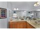 Bathroom showcasing dual sinks, ample counter space, and a large mirror at 14213 Southern Red Maple Dr, Orlando, FL 32828