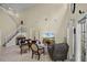 Spacious living room with high ceilings, tile floors, and plenty of natural light, perfect for entertaining at 14213 Southern Red Maple Dr, Orlando, FL 32828