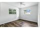 Bright bedroom with two windows offering natural light and views of outside greenery at 161 Peacock, Altamonte Springs, FL 32701